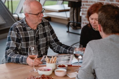 Advies van bouwadviseur tijdens infosessie
