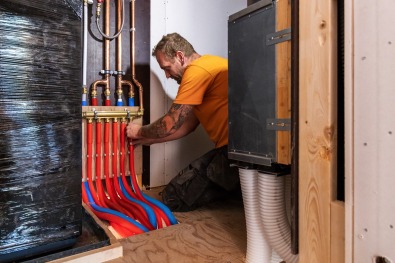 Installatie van vloerverwarming in een houtskeletbouwwoning