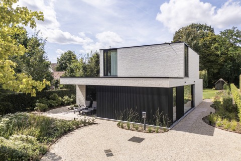 Exterieur moderne villa greige gevelsteen